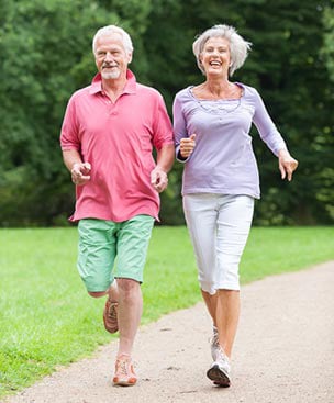 old age couple jogging